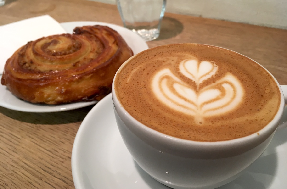 Coffee and pastry by Espresso Embassy