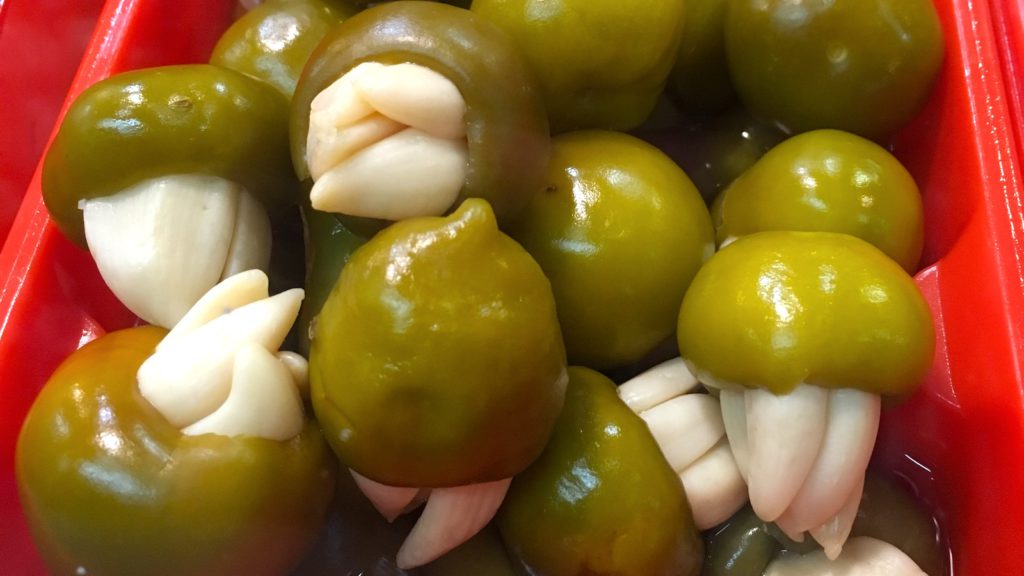 Pickled cherry pepper and garlic at the food market of Budapest - Vegan Food Tour