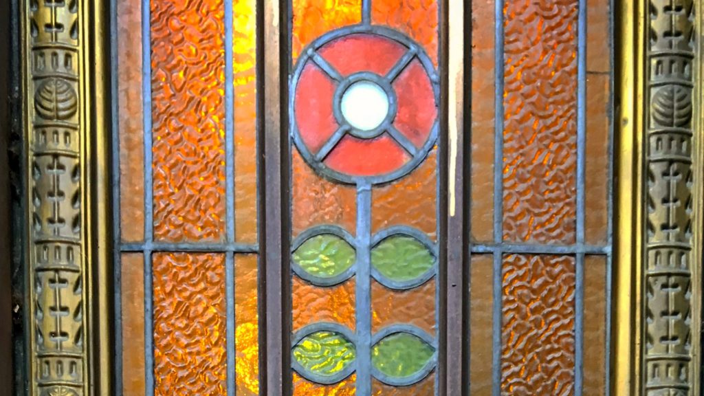 Budapest Art Nouveau Tour - a detail of a stained glass door